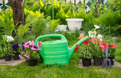 Visual of a gardening team assessing a complaint and discussing resolution
